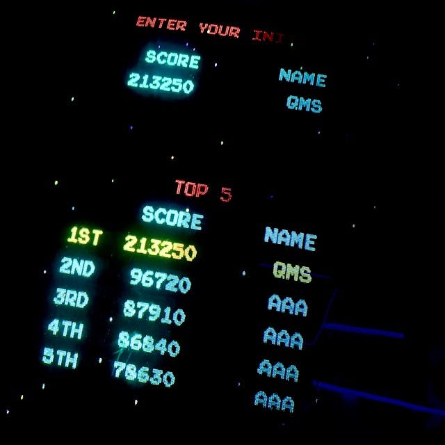 Galaga arcade game high score leaderboard; 1st place, with a score of 213250, QMS